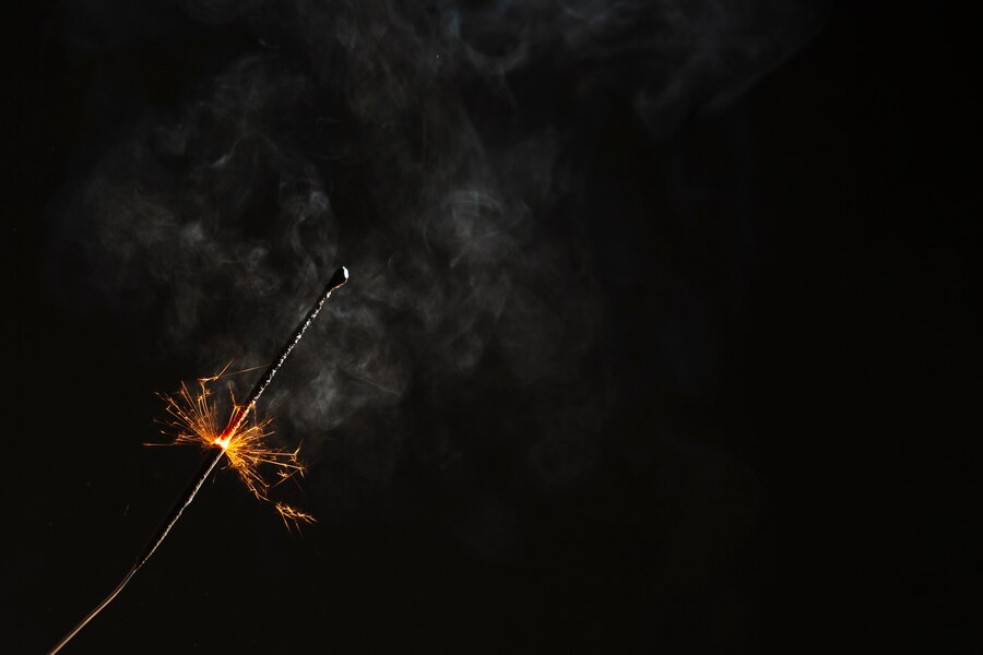 sparkler-flaming-black-background_23-2147734864